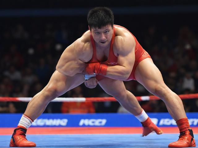 九游体育网站_ 传统摔跤表演，传承文化展现力量，体育摔跤项目